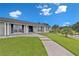 Charming single story home with an inviting front porch with decorative brick and a well manicured lawn at 105 Spring Cove Trl, Altamonte Springs, FL 32714