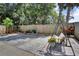 Paved backyard area with green perimeter and a swing bench to complete an outdoor oasis at 107 Pamala Ct, Sanford, FL 32771