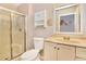 Traditional bathroom featuring a vanity, toilet, and shower with sliding glass door at 107 Pamala Ct, Sanford, FL 32771