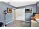 Compact bedroom with carpet, a closet, art, and a desk area for work or study at 107 Pamala Ct, Sanford, FL 32771