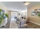 Comfortable living room featuring modern decor, plush seating, and a seamless indoor-outdoor flow at 113 Venetian Bay Cir, Sanford, FL 32771