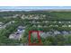 Lovely aerial view of the property and surrounding neighborhood, with mature trees and landscaping at 11415 N Camden Commons Dr, Windermere, FL 34786