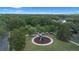 Charming neighborhood playground with modern play structure and mature shade trees at 11415 N Camden Commons Dr, Windermere, FL 34786
