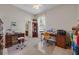 Functional home office featuring a desk, bookcase, and comfortable seating at 11415 N Camden Commons Dr, Windermere, FL 34786