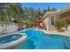 Backyard with a private pool, spa and landscaped gardens at 11415 N Camden Commons Dr, Windermere, FL 34786