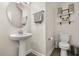 Clean and functional half bathroom featuring a pedestal sink at 11993 Charades St, Orlando, FL 32832