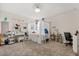 This comfortable bedroom features white decor, a canopy bed, and carpeted floors at 11993 Charades St, Orlando, FL 32832