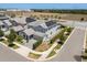 Inviting two-story home with solar panels, a two-car garage, and neat landscaping, located on a corner lot at 11993 Charades St, Orlando, FL 32832