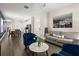 Bright living room features stylish seating, modern decor, and neutral paint for a relaxing and inviting atmosphere at 11993 Charades St, Orlando, FL 32832