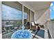 Balcony with seating, furniture, and view at 13415 Blue Heron Beach Dr # 409, Orlando, FL 32821