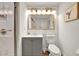 Bathroom featuring vanity, toilet, and glass enclosed shower at 13415 Blue Heron Beach Dr # 409, Orlando, FL 32821