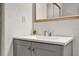 Bathroom vanity featuring gray cabinetry, a white countertop, and modern fixtures at 13415 Blue Heron Beach Dr # 409, Orlando, FL 32821