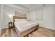 Comfortable bedroom with a king bed, soft lighting and a window with blinds at 13415 Blue Heron Beach Dr # 409, Orlando, FL 32821