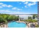 Wonderful views of the pool, lake, and surrounding greenery from this unit's private balcony at 13415 Blue Heron Beach Dr # 409, Orlando, FL 32821