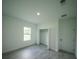 Bedroom with closet, large windows and natural light at 13621 Sw 40Th Cir, Ocala, FL 34473