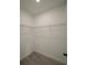 Spacious walk-in closet features wire shelving and modern flooring at 13621 Sw 40Th Cir, Ocala, FL 34473