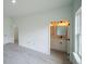 Main bedroom showcasing en-suite bathroom and walk in closet at 13621 Sw 40Th Cir, Ocala, FL 34473