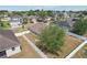 A well maintained house featuring a spacious backyard and new white vinyl fence at 140 Highland Meadows St, Davenport, FL 33837