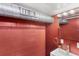 Red half-bathroom with a modern sink at 141 S Lawsona Blvd, Orlando, FL 32801