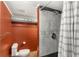 Compact bathroom featuring a tiled shower and classic fixtures offering functionality and a modern feel at 141 S Lawsona Blvd, Orlando, FL 32801