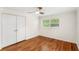 Bedroom with hardwood floors, a closet, and natural light at 141 S Lawsona Blvd, Orlando, FL 32801