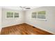 Bedroom featuring hardwood floors and natural light at 141 S Lawsona Blvd, Orlando, FL 32801