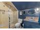 Elegant bathroom featuring a glass-enclosed shower, stylish vanity, and modern fixtures at 141 S Phelps Ave, Winter Park, FL 32789