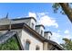 Close up view of the home's dormer windows, roof line, and unique architectural details at 141 S Phelps Ave, Winter Park, FL 32789