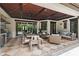 Inviting outdoor patio with wood ceiling, ceiling fan, and tiled floors, perfect for entertaining at 141 S Phelps Ave, Winter Park, FL 32789