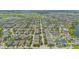 Large community featuring single-Gathering homes, tree-lined streets and several ponds at 14244 Walcott Ave, Orlando, FL 32827