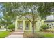 Inviting home featuring brick steps leading to the front door and lush landscaping at 14244 Walcott Ave, Orlando, FL 32827