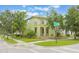 Charming two-story home situated on a corner lot with well-manicured landscaping at 14244 Walcott Ave, Orlando, FL 32827