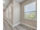 Hallway filled with natural light, showcasing three windows at 14244 Walcott Ave, Orlando, FL 32827