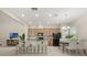 Spacious kitchen featuring a large island, stainless appliances, and adjacent dining area at 14244 Walcott Ave, Orlando, FL 32827
