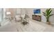 Bright living room with contemporary decor and large windows at 14244 Walcott Ave, Orlando, FL 32827