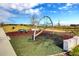 Community playground with modern play structures, soft turf, and landscaped surroundings at 14244 Walcott Ave, Orlando, FL 32827