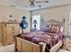 Spacious bedroom featuring natural light, ceiling fan and carpeted floors at 1449 Amanda Rd, Kissimmee, FL 34744