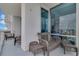 Balcony seating area, perfect for relaxation and enjoying the fresh air at 150 E Robinson St # 2002, Orlando, FL 32801