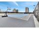 Full basketball court for friendly games with a cityscape backdrop at 150 E Robinson St # 2002, Orlando, FL 32801