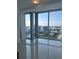 Bright room with stunning city and lake view from large windows showcasing the waterfront scenery at 150 E Robinson St # 2002, Orlando, FL 32801