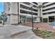 Welcoming entrance to The Vue at Lake Eola features landscaping and a glass awning at 150 E Robinson St # 2002, Orlando, FL 32801