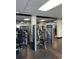 Modern gym equipped with weight machines and fitness equipment for residents' health and wellness at 150 E Robinson St # 2002, Orlando, FL 32801