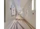 Long, well-lit hallway featuring elegant decor and attractive artwork at 150 E Robinson St # 2002, Orlando, FL 32801