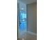 Hallway overlooking the city with floor-to-ceiling windows and modern finishes at 150 E Robinson St # 2002, Orlando, FL 32801