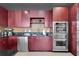 A stylish kitchen offers stainless steel appliances, granite countertops and sleek cabinetry at 150 E Robinson St # 2002, Orlando, FL 32801
