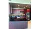 Modern kitchen with dark cabinetry, stainless steel appliances, and a large island at 150 E Robinson St # 2002, Orlando, FL 32801