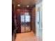 Kitchen featuring stainless steel refrigerator and dark wood cabinets at 150 E Robinson St # 2002, Orlando, FL 32801