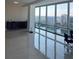 Bright living room with floor-to-ceiling windows offering city and lake views at 150 E Robinson St # 2002, Orlando, FL 32801