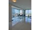 Spacious living room with floor-to-ceiling windows and city views at 150 E Robinson St # 2002, Orlando, FL 32801