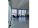 Bright, modern living room with floor to ceiling windows and a city view at 150 E Robinson St # 2002, Orlando, FL 32801